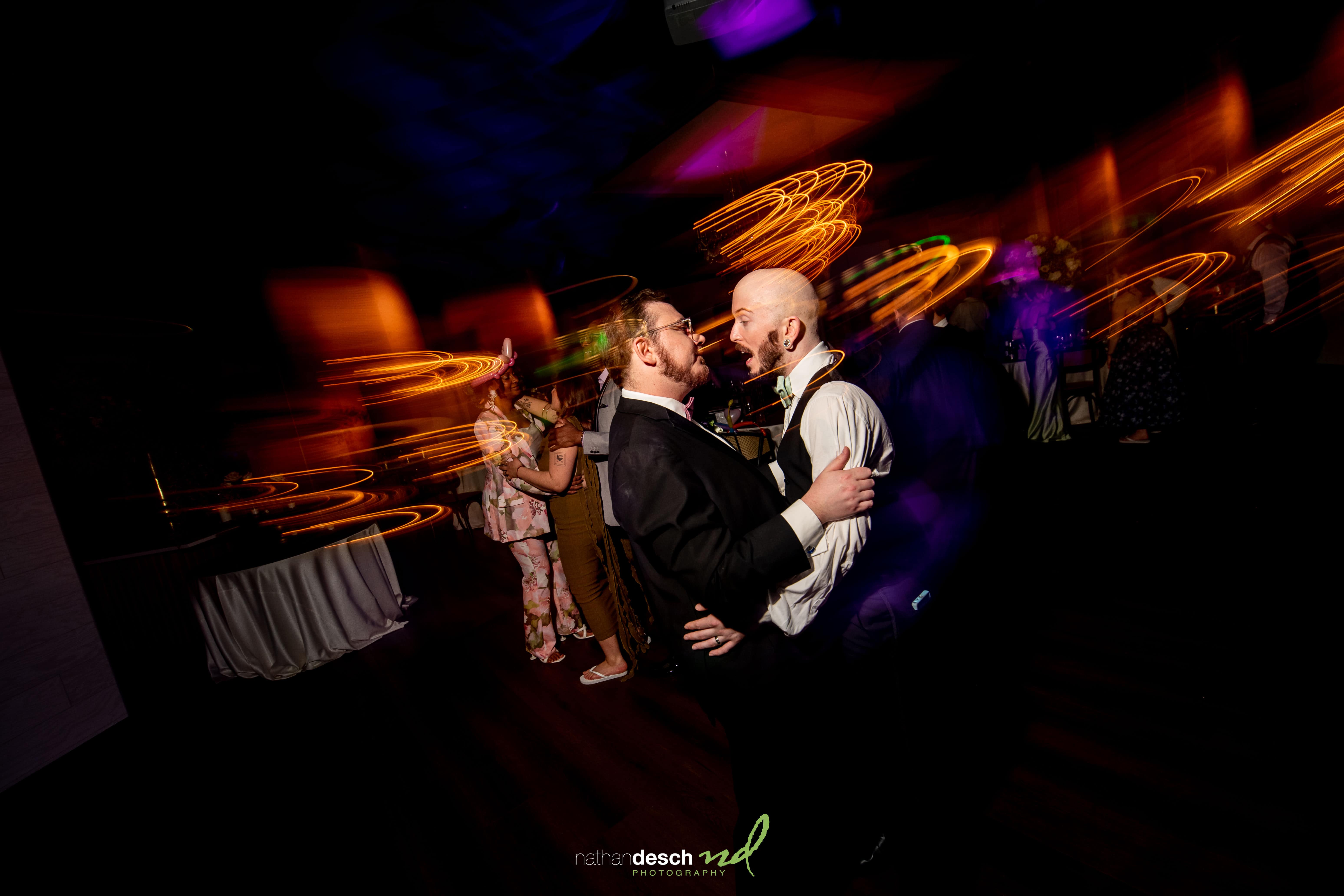 grooms dancing at tendenza