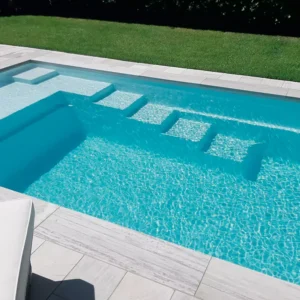 Northern Colorado Pools’ The Elite offers easy care and comfort, making your backyard a perfect spot to relax and enjoy.