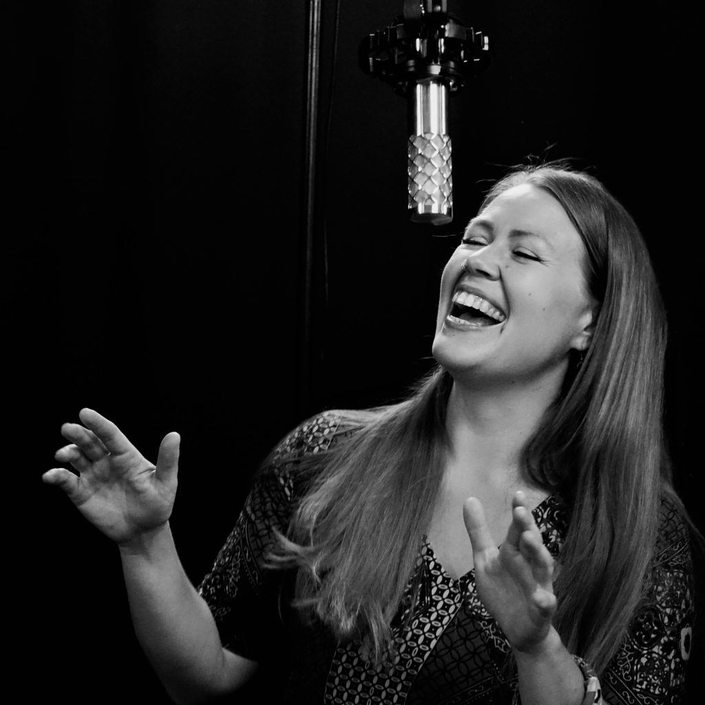 Vocal Recording with NU-100K Charlotta Kerbs singing joyfully into a NU-100K microphone in a professional studio