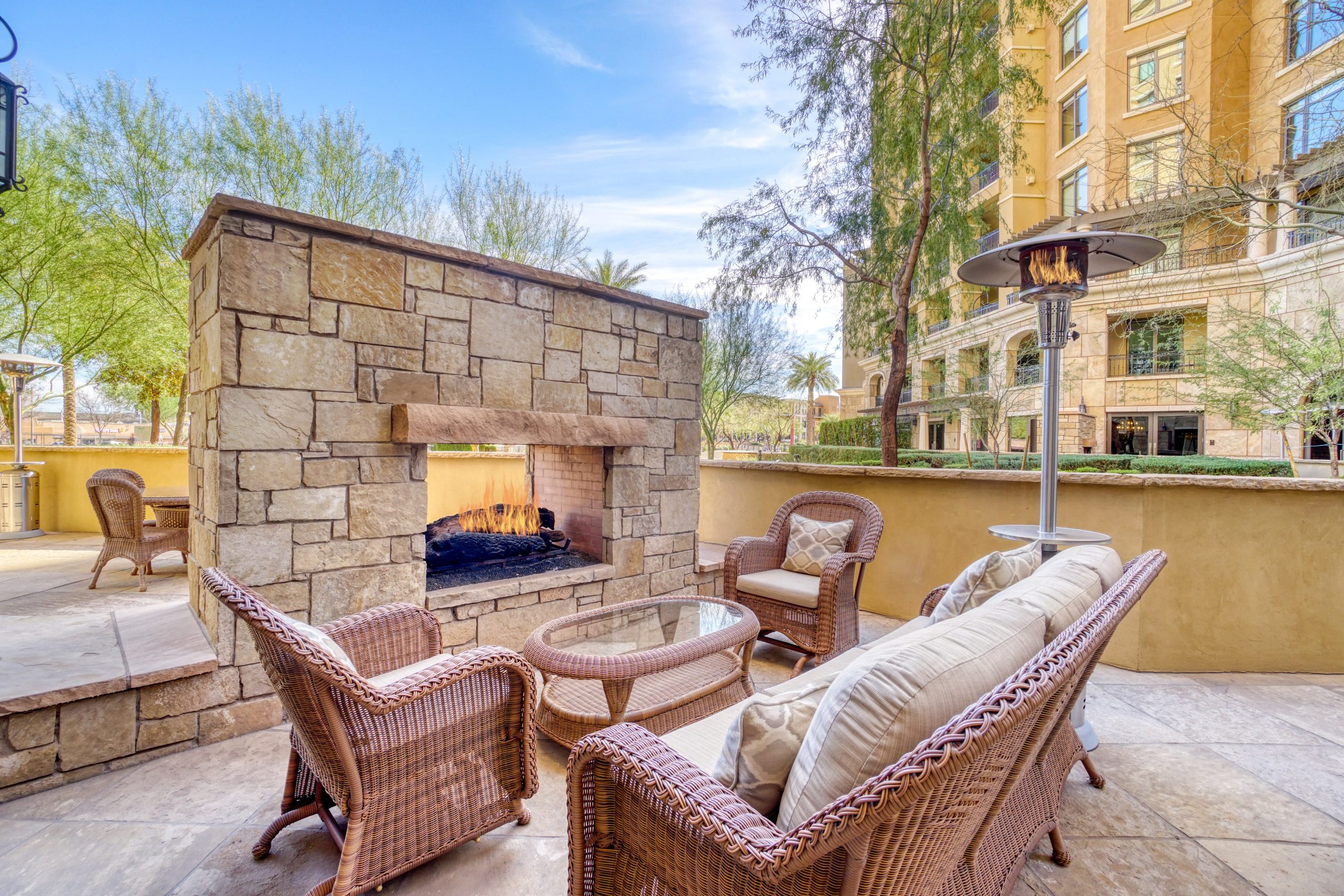 Custom-built outdoor fireplace with stone masonry.