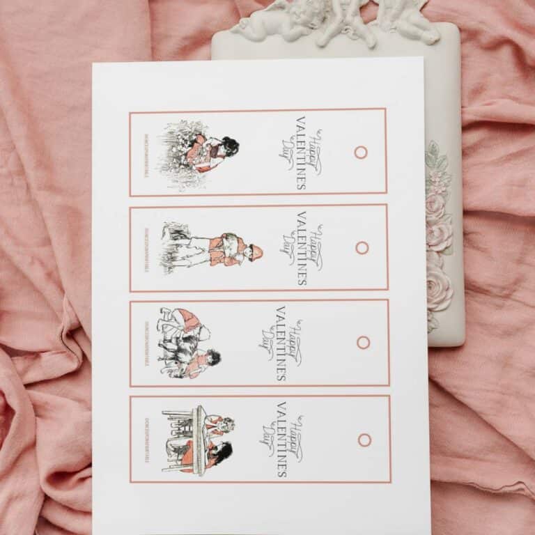 Vintage illustrated Heidi Valentine's Day bookmarks on a pink blanket.