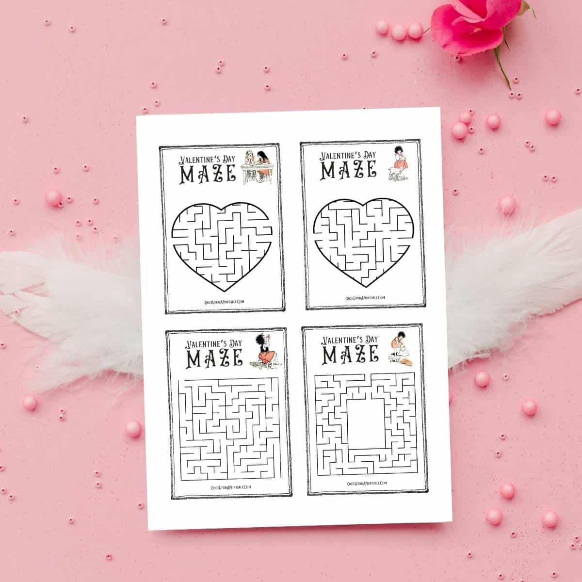 Jessie Willcox Smith "Heidi" illustrated Valentine's Day maze cards on a pink background with feathers and flower petals.