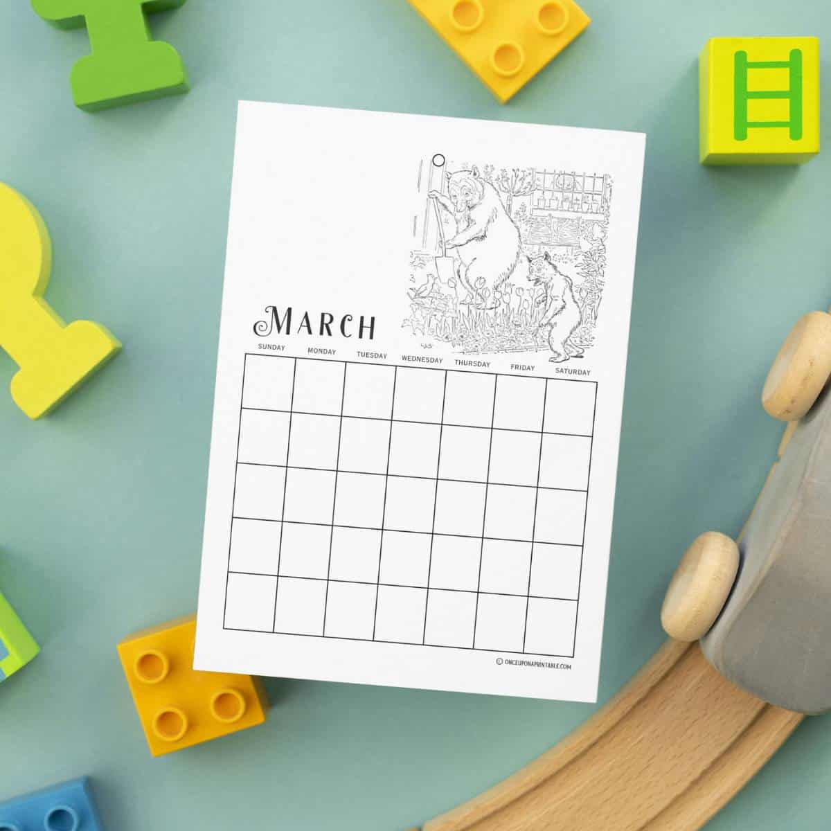 The three bears calendar coloring pages, displayed on a blue table with legos and train set.