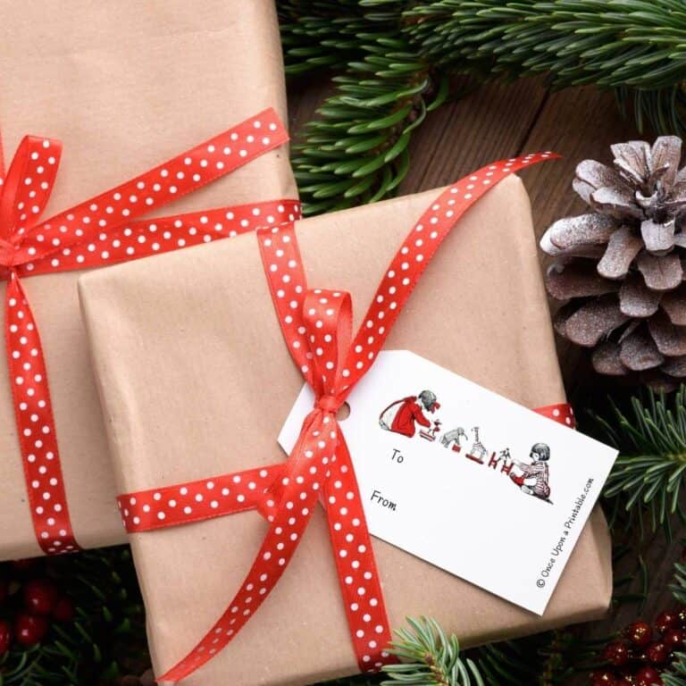 Simple vintage Christmas gift tags on brown paper wrapped boxes and red ribbon, adorned with a vintage illustration by Jessie Willcox Smith's version of Twas the night before Christmas story.