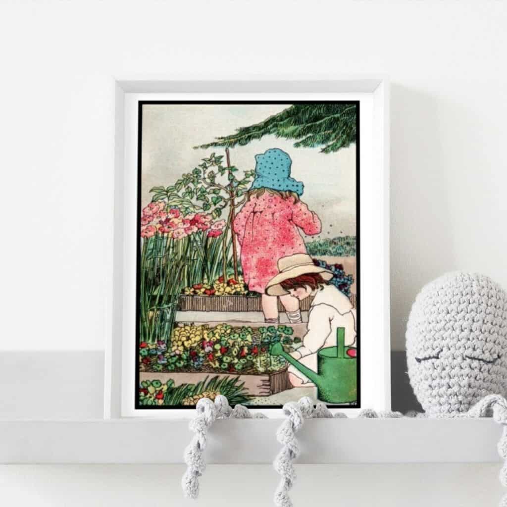 Things in our garden illustration of two children playing in a garden framed and displayed on a shelf in a children's room.