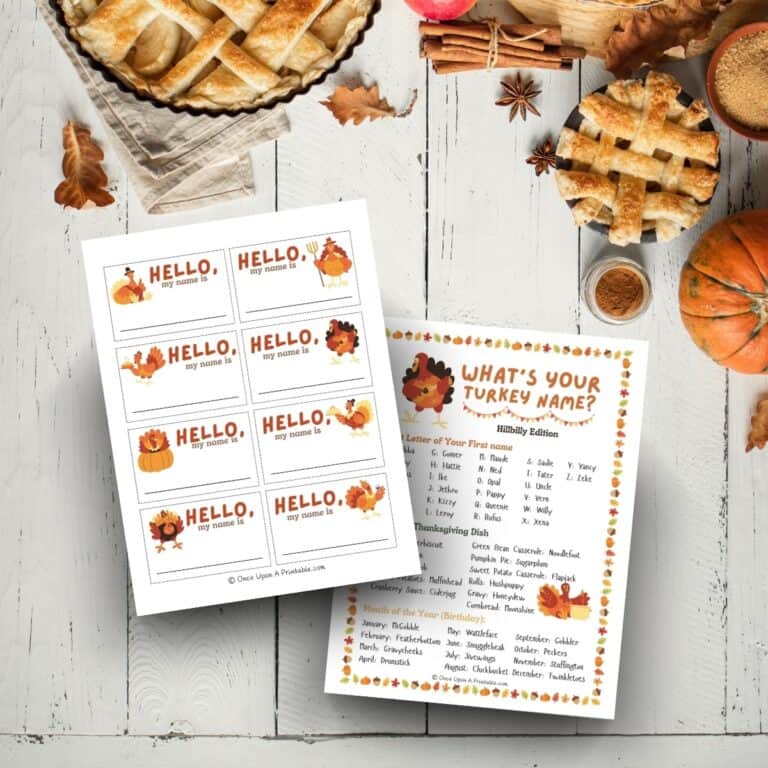 What's your turkey name printable with fun turkey graphics displayed on a wooden surface with apple pieces and pumpkins.