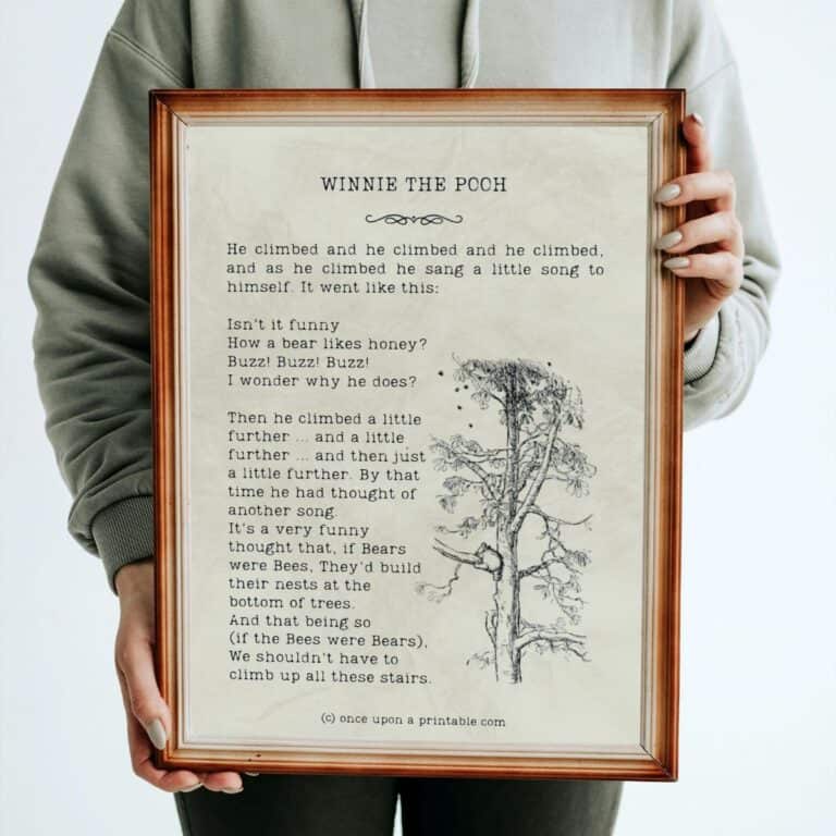 A winnie the pooh quotes by A A Milne with original illustration by E H Shepard framed and held in a woman's arms.