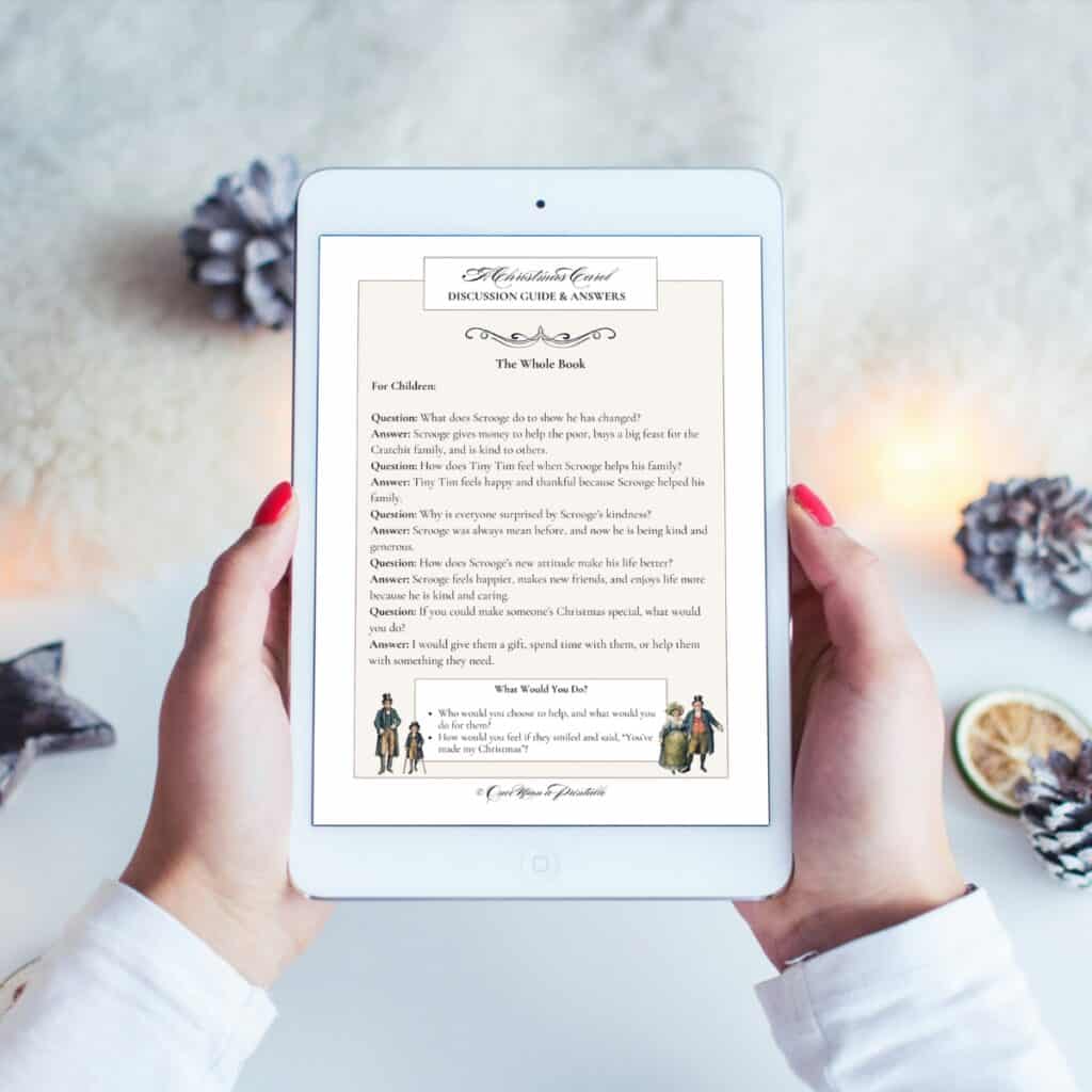 Charles Dickens' A Christmas Carol companion children's discussion guide and answers on a tablet held by a woman's hands.