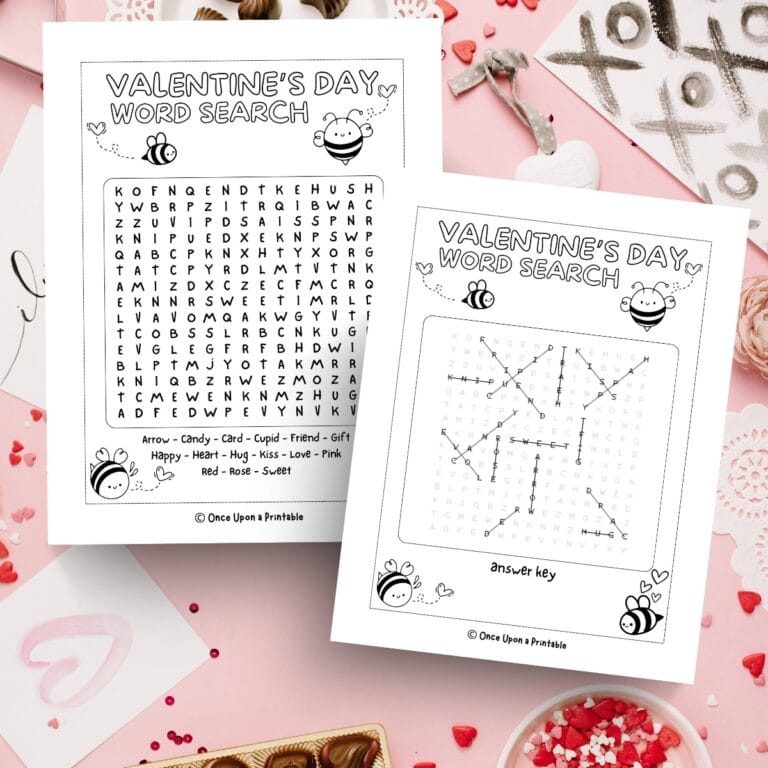 Valentine's Day crossword puzzles laying on a messy candy background.