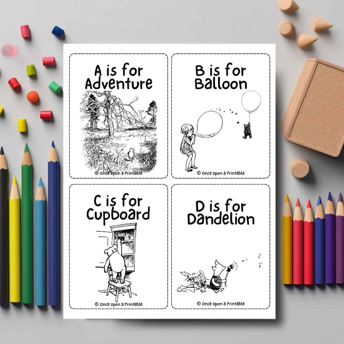 Classic Winnie the Pooh coloring ABC flashcards with coloring pencils.