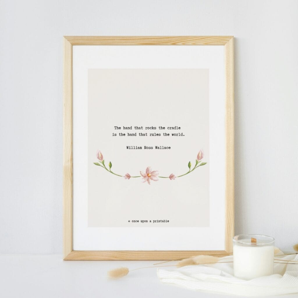 William Ross Wallace quote with watercolor flowers framed on display.
