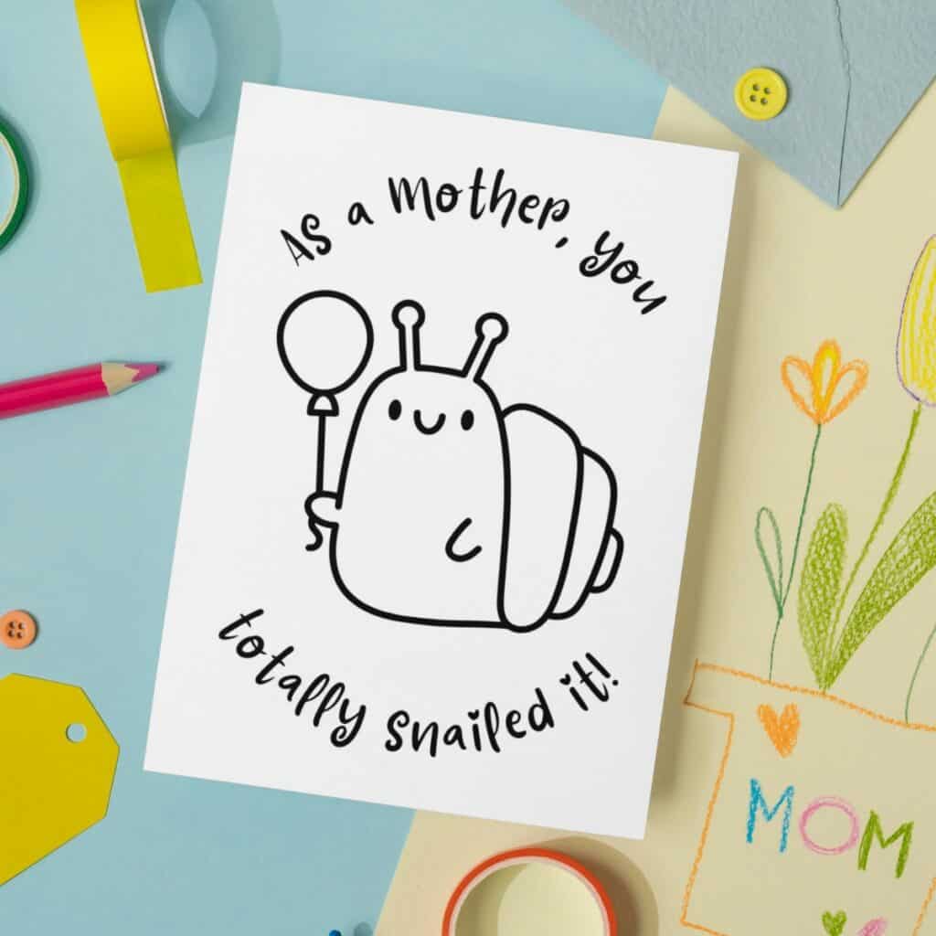 Snailed it Mother's day card for kids to color, laying on a blue background.