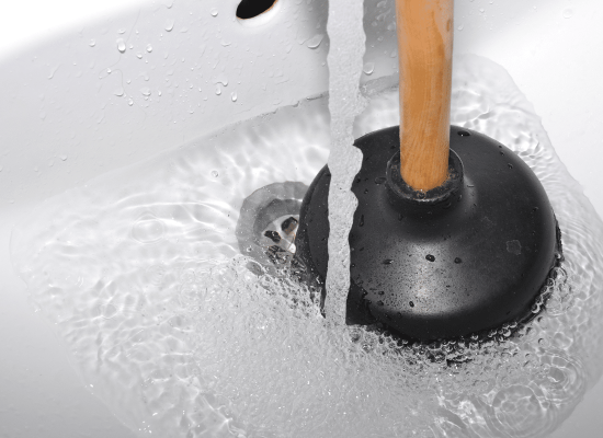 Close-up of a clean sink drain after a professional service