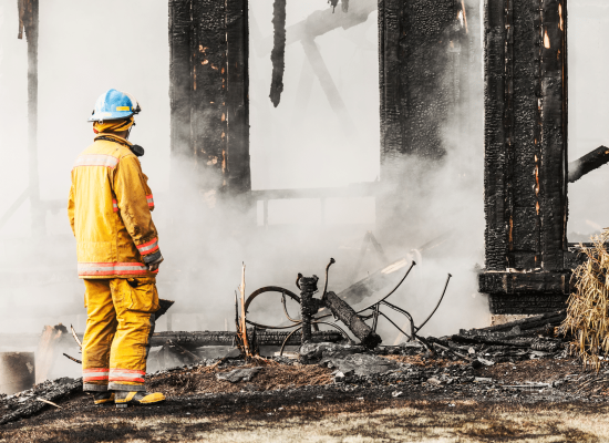 Restoration team assessing residential fire damage