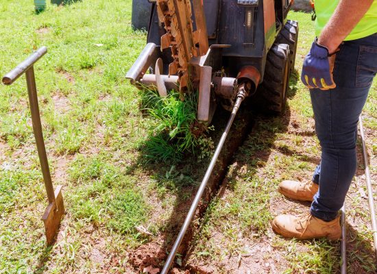 Crew performing HDD to install utility lines with minimal surface disruption