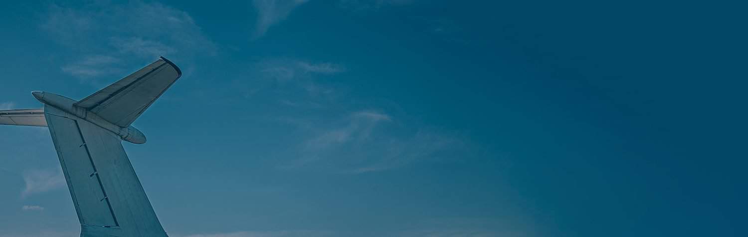 Aircraft tail in the blue sky