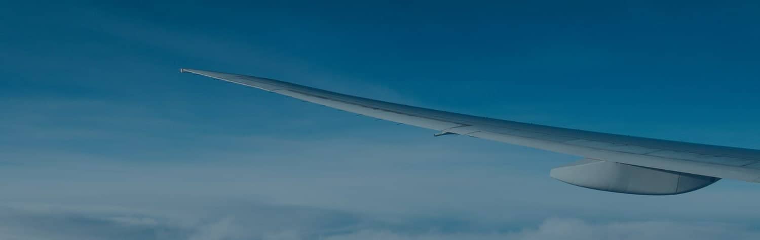 Aircraft wing flying through the sky