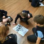 pupils sitting reading