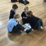 pupils sitting reading