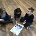pupils sitting reading