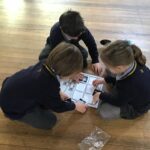 pupils sitting reading