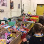 pupils creating xmas shoe box parcels