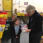 pupils creating xmas shoe box parcels