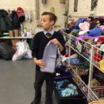 pupils creating xmas shoe box parcels