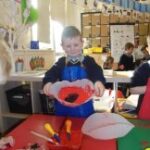 Pupils creating poppies