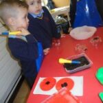 Pupils creating poppies