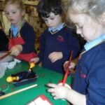 Pupils creating poppies