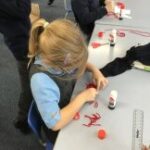 Pupils creating poppies