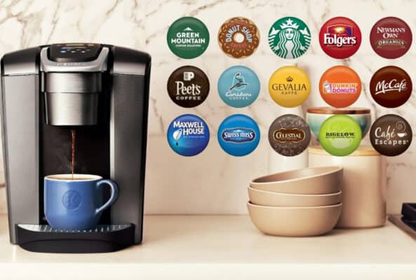 Coffee maker with various brand pods on display.