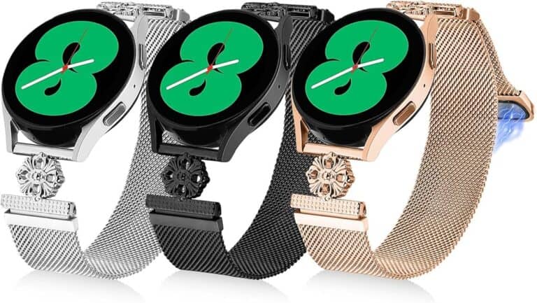 Three smartwatches with metallic bands display time