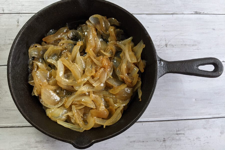 cast iron skillet with onions