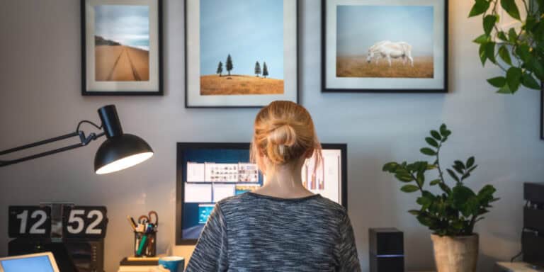 work from home woman sitting at computer