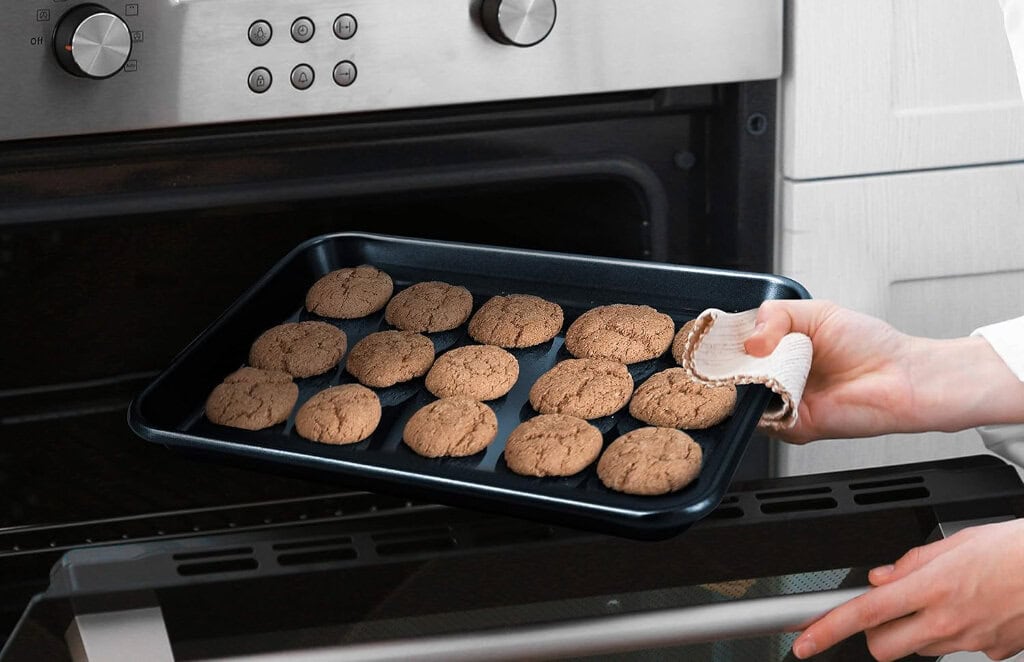 Freshly baked cookies removed from oven