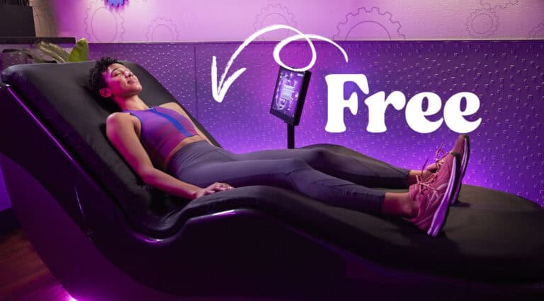 Person relaxing on massage chair, free session offered.
