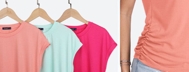 Colorful women's t-shirts on hangers