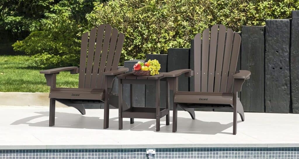 Adirondack chairs and table by the poolside.