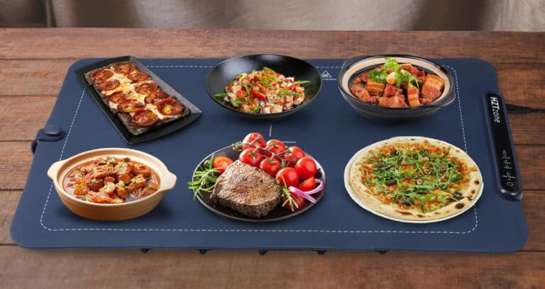 Variety of dishes on a warming mat.