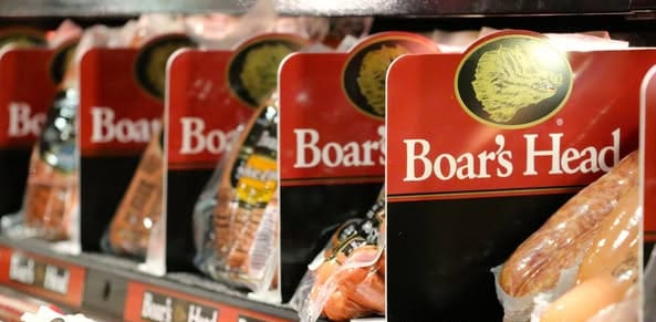Boar's Head deli meats displayed in supermarket shelf.