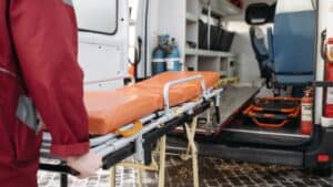 Stretcher and ambulance