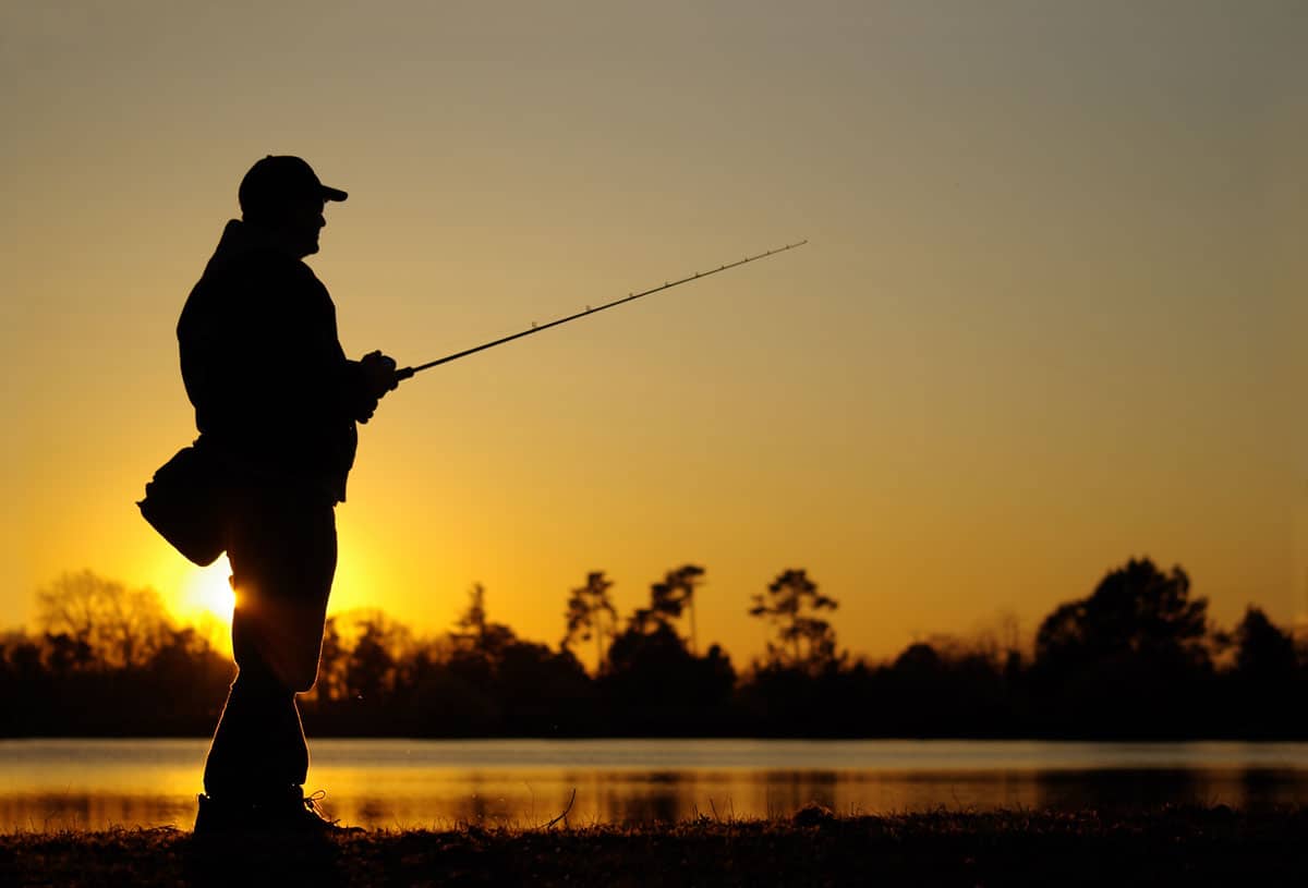 man fishing on the shore