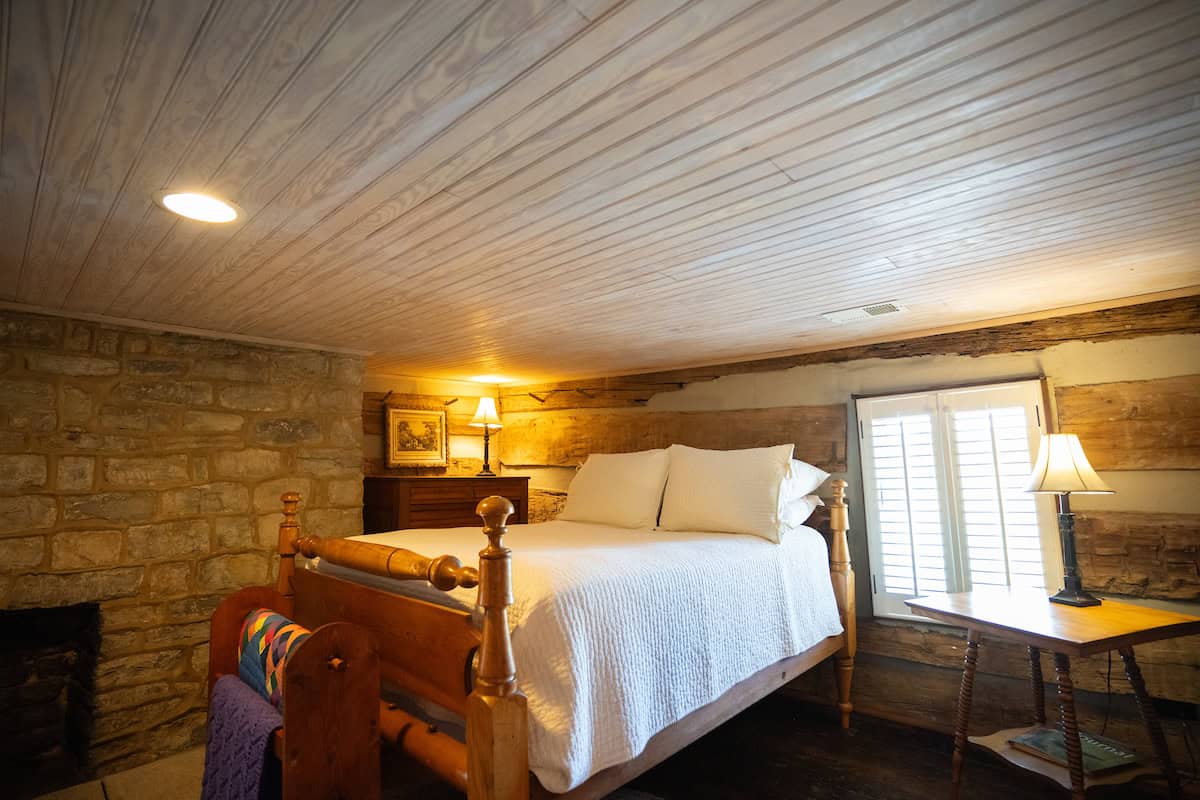 Fisher Ford house - The house is made up of a two-story log cabin that was once part of a school that is rumored to have taught a Kentucky governor. A Victorian addition was built in the late 1800s and gives the two downstairs bedrooms tall ceilings and light. The third bedroom is in the loft of the cabin and accessed by a ladder.