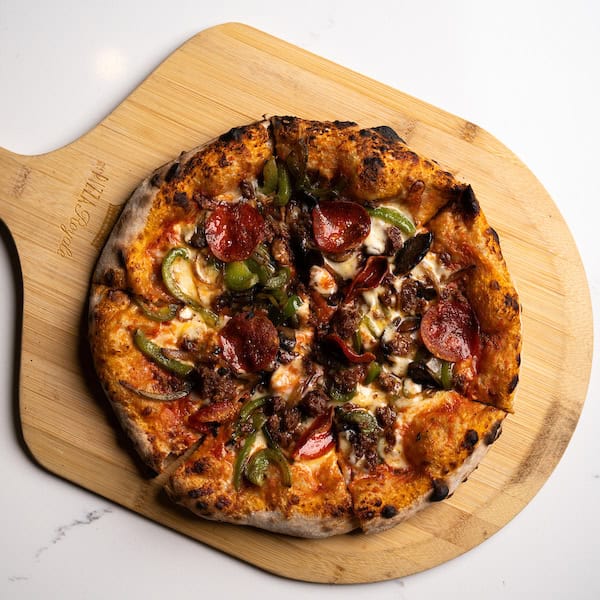 Marksbury Farm Italian sausage with pepperoni, onion, pepper, and mushroom pizza from Mama DeVechio's Pizzeria