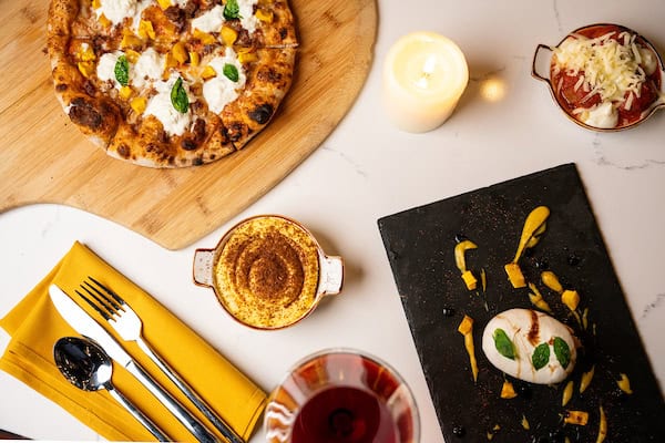 Wood-fired pizza, ricotta meatballs and whipped ricotta from Mama DeVechio's Pizzeria