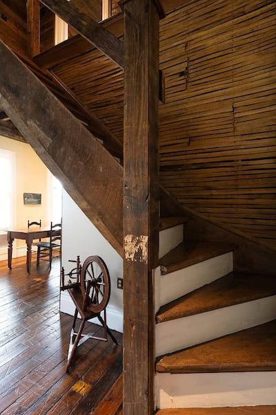 Restored staircase leading upstairs to loft area and second bedroom at the Hart House