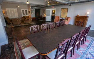 Comfortable seating option and board meeting table available for corporate retreat or meeting for guests of The Stanford Inn