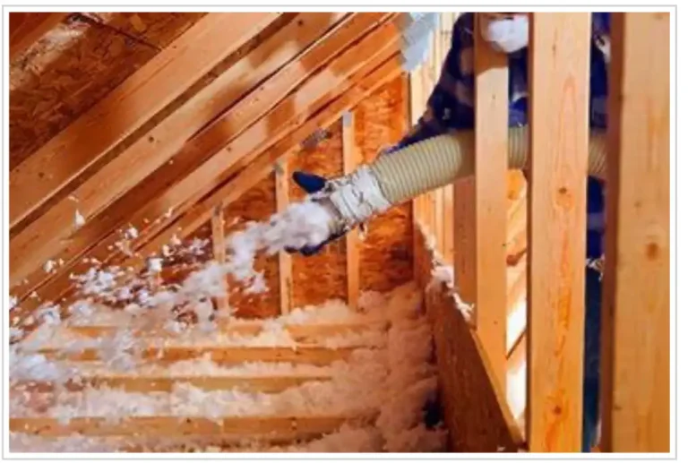 Blown in insulation in attic